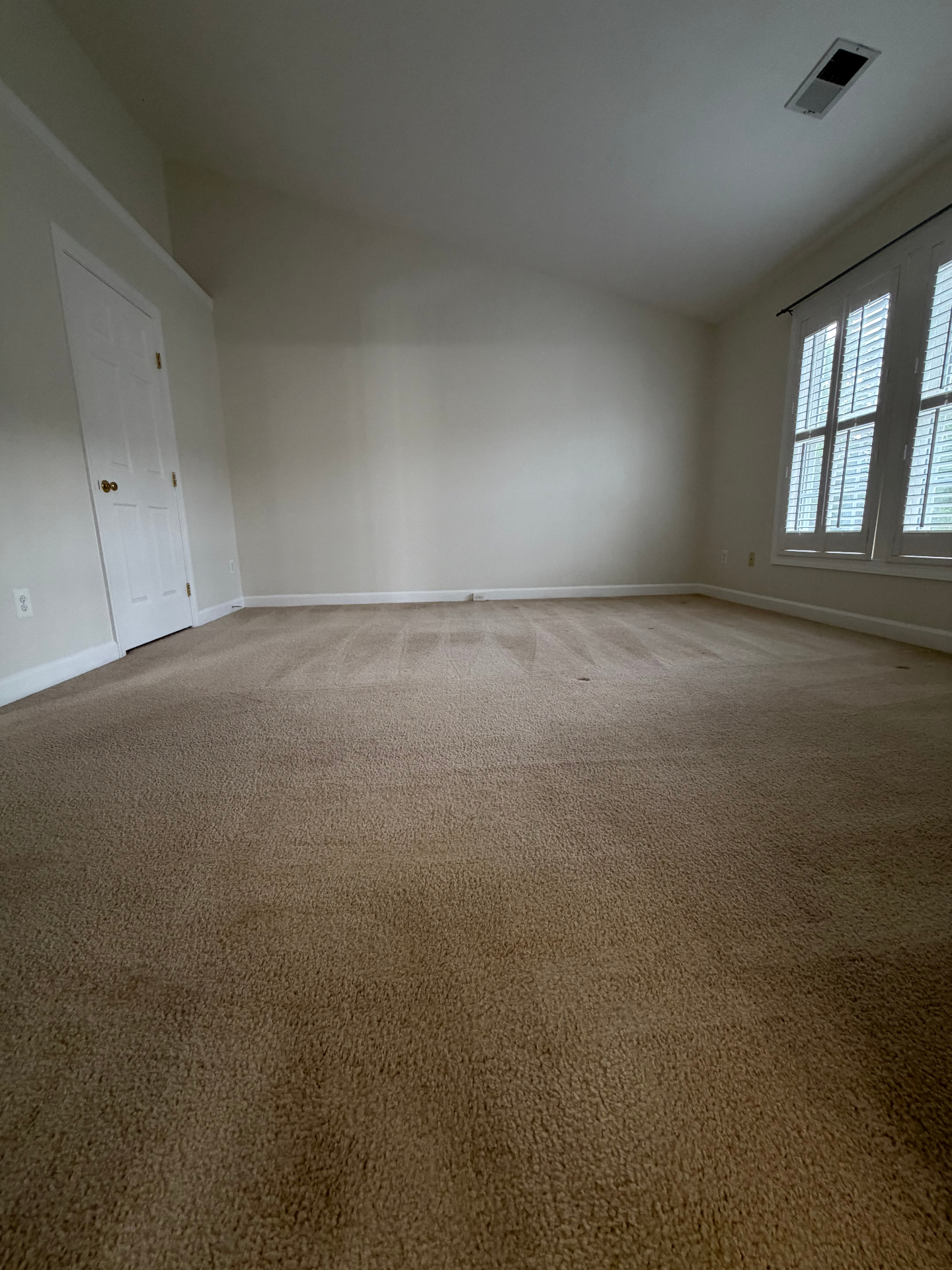 Primary bedroom with tray ceiling
